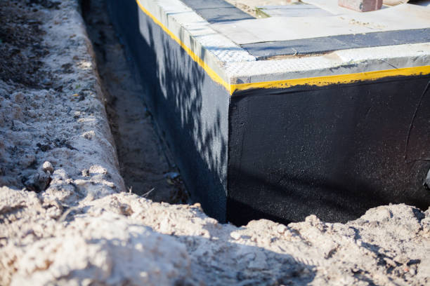 Professional Emergency Waterproofing technician working in Milltown, NJ